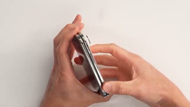 Dave2D holding the closed Duo, showing its side profile
