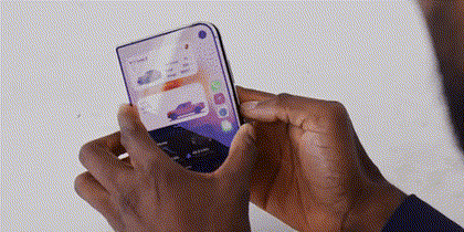 MKBHD unfolding the Duo into laptop mode