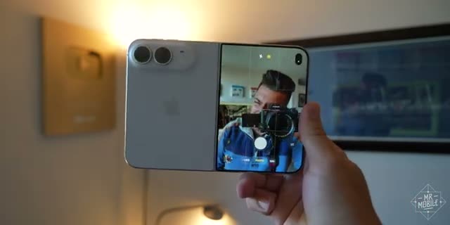 MrMobile using the half-folded Duo as its own tripod for a selfie
